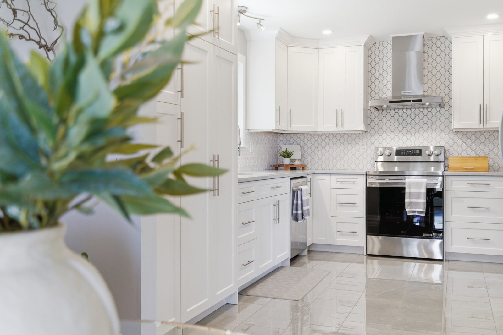 Fully renovated white kitchen at 3006 King Richard Drive